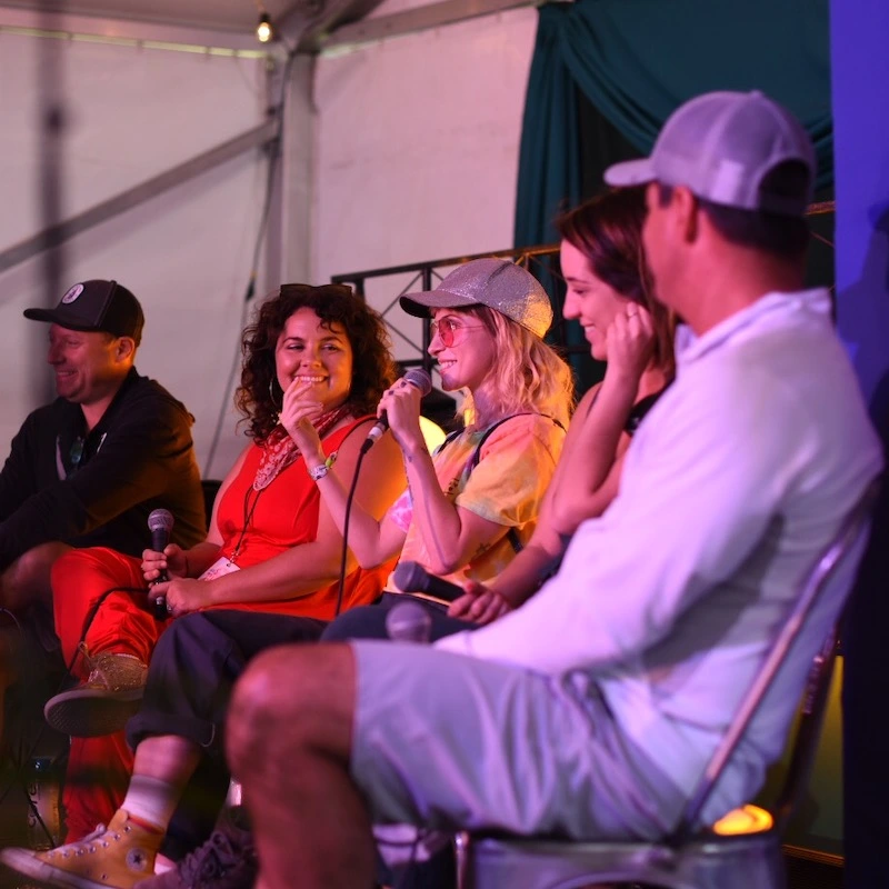 Students listening to a panel at Bonnaroo