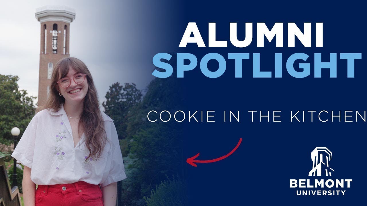 Belmont University Alumni Spotlight featuring Emily Henegar, founder of 'Cookie in the Kitchen.' Emily is smiling, wearing red glasses and a white shirt with floral embroidery. Behind her is Belmont’s iconic Bell Tower. The text reads, 'Alumni Spotlight: Cookie in the Kitchen' with the Belmont University logo at the bottom right.