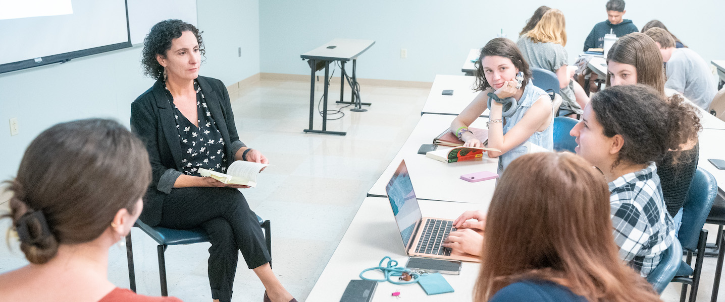 Students with Dr. Susan Finch in a classroom