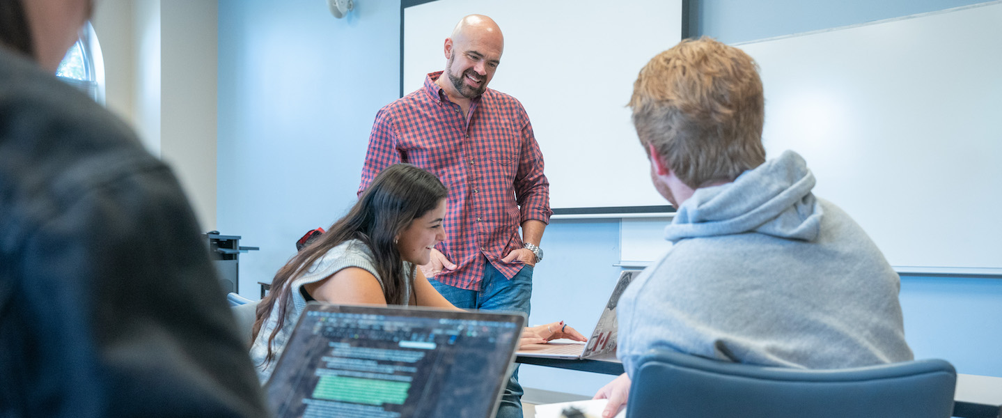 Dr. Jeremy Fyke and students learn in a Belmont classroom