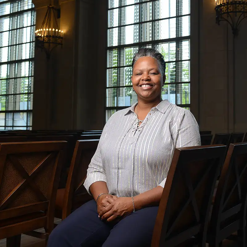 An Adult Degree student sitting in Belmont's Chapel