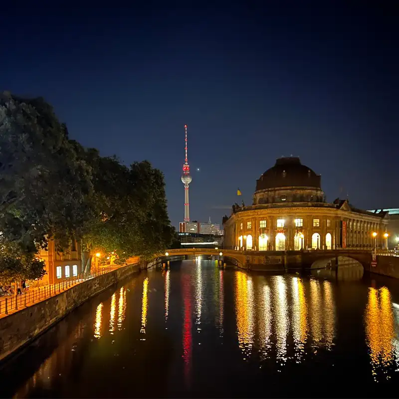 An outdoor photo at night time of Fernsehturm Berlin