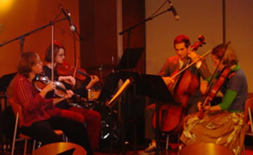 String Quartet Ensemble playing on stage