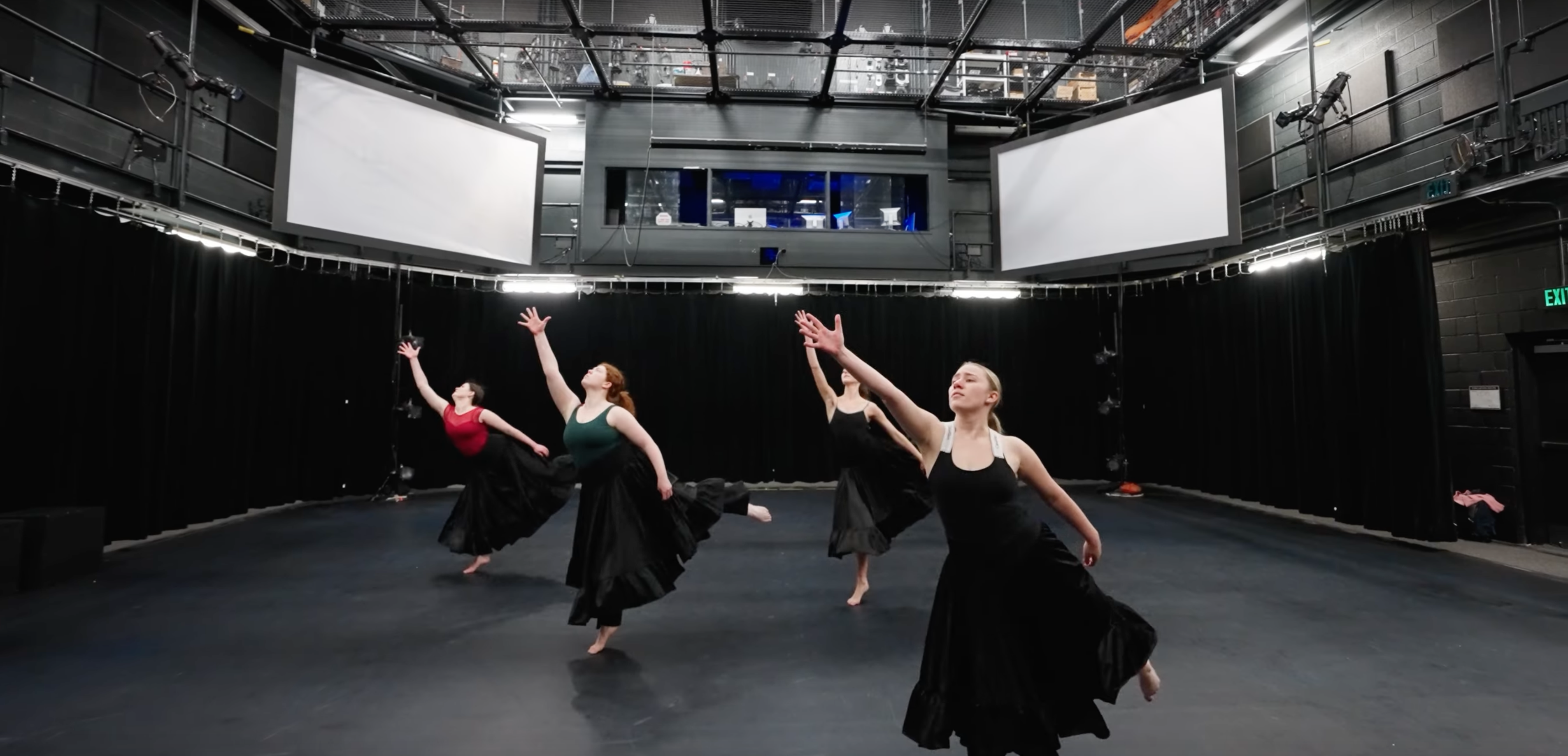 Dancers practicing and performing in a practice room