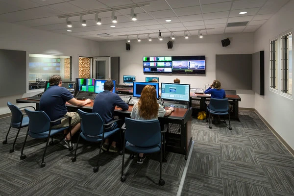 Students directing footage in the TV Production studio