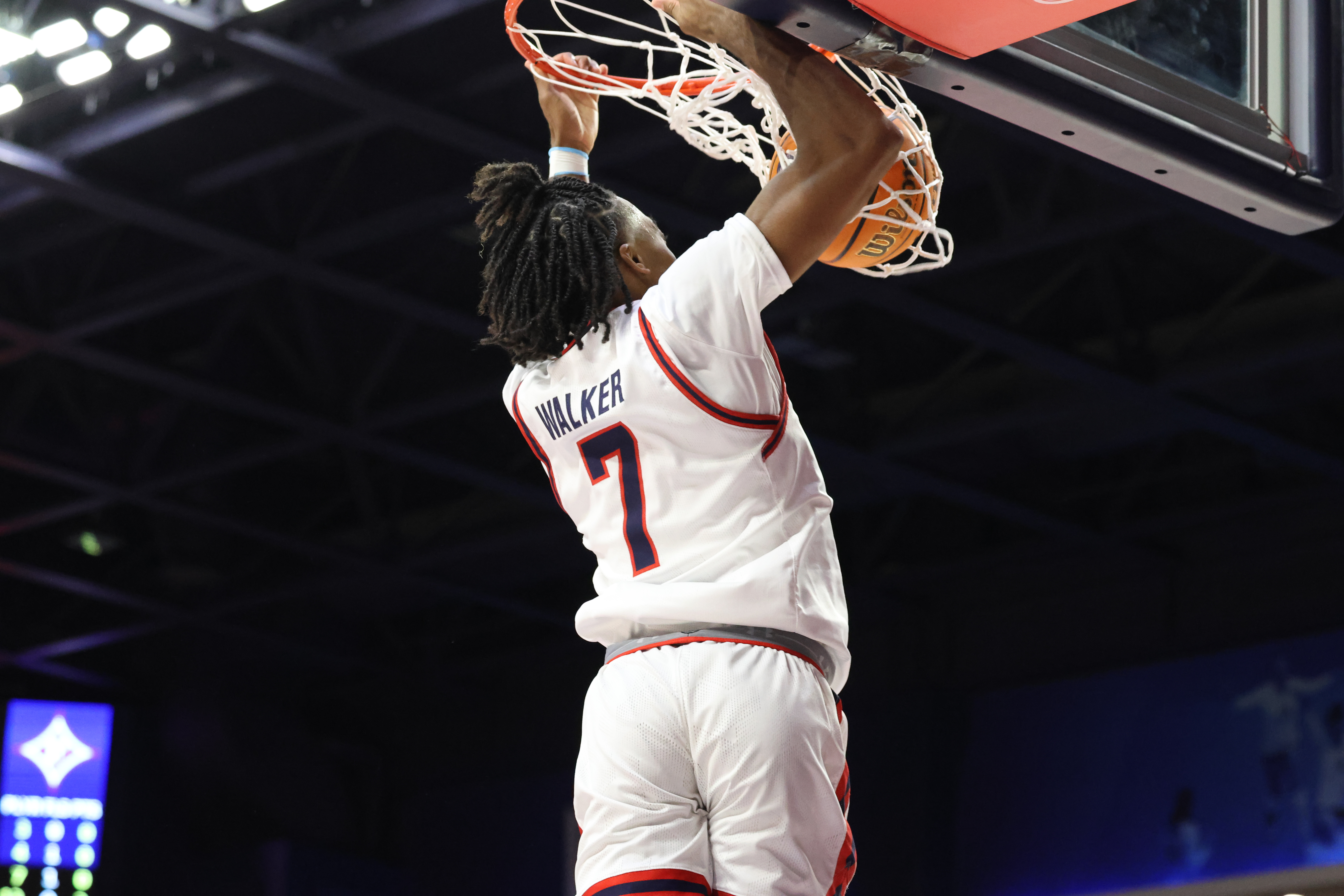 Isaiah Walker goes in for a slam dunk against Furman