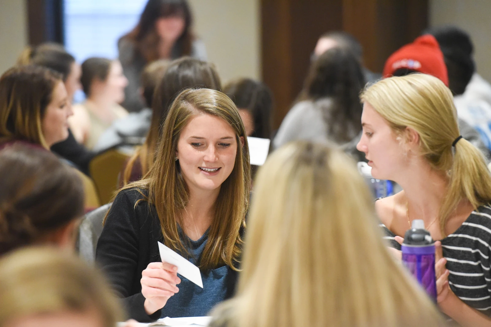 Second year students working with flash cards during a team exercise