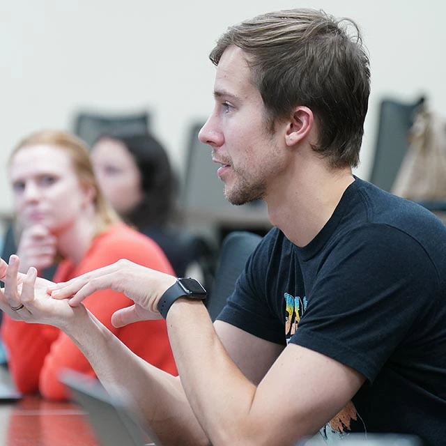 students talking during class room discussion