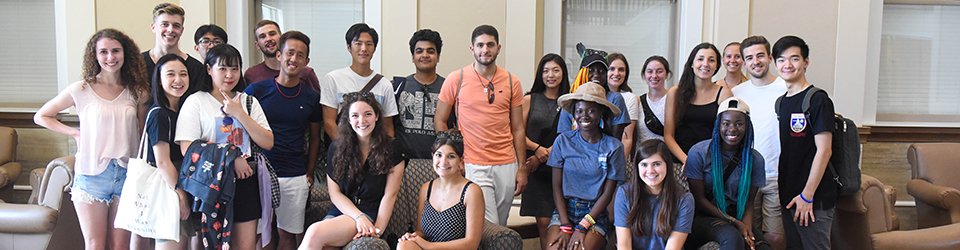 Students posing for a picture in Massey Business Center