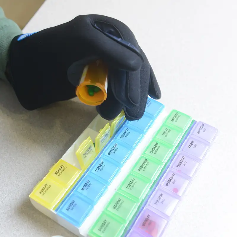 Close up of pills being sorted in pharmacy lab