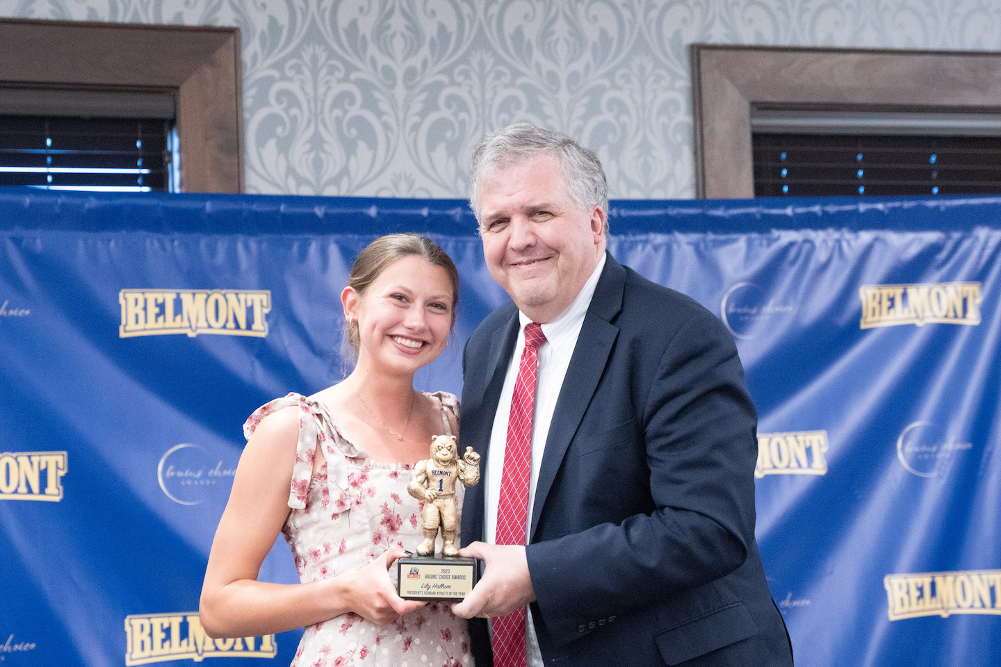 Lily Hallum and University President Greg Jones