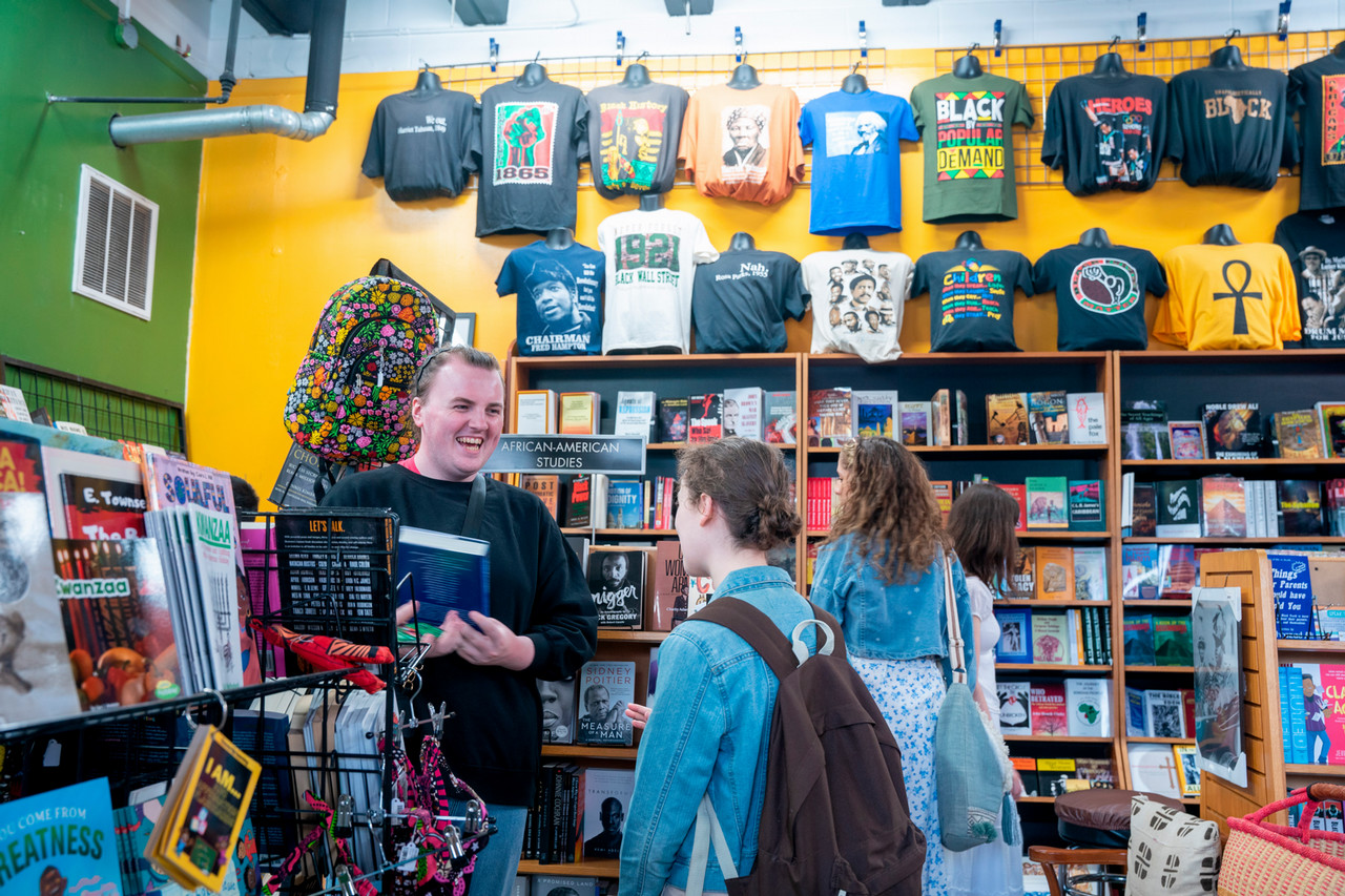 Students visit Alkebu-Lan Images on Jefferson St.