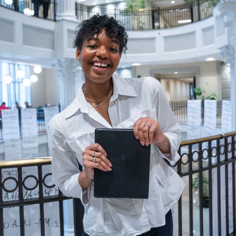 Alisa Osborne poses at a forensics tournament