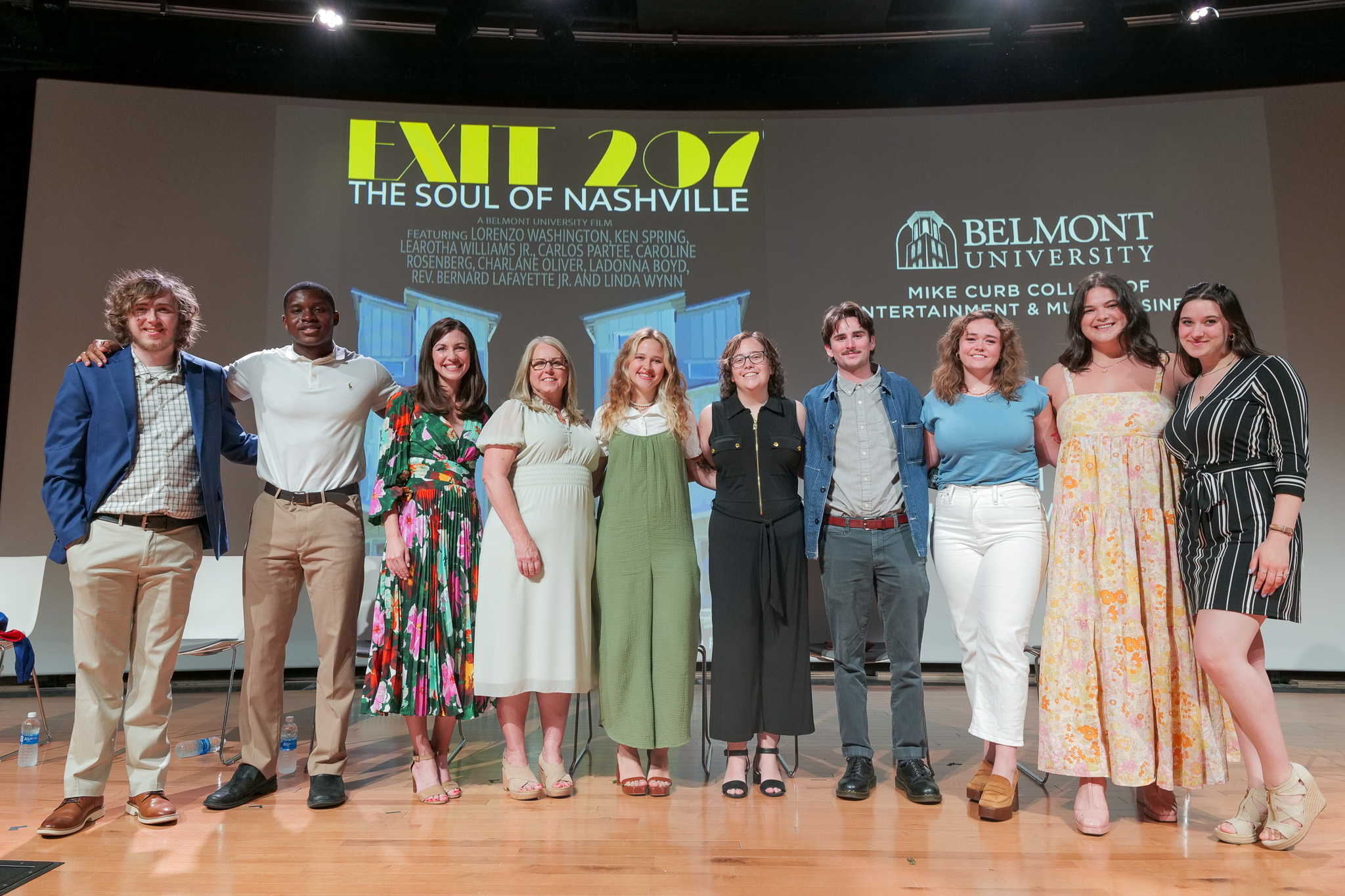 Students line up on stage at the Exit 207 screening at NMAAM