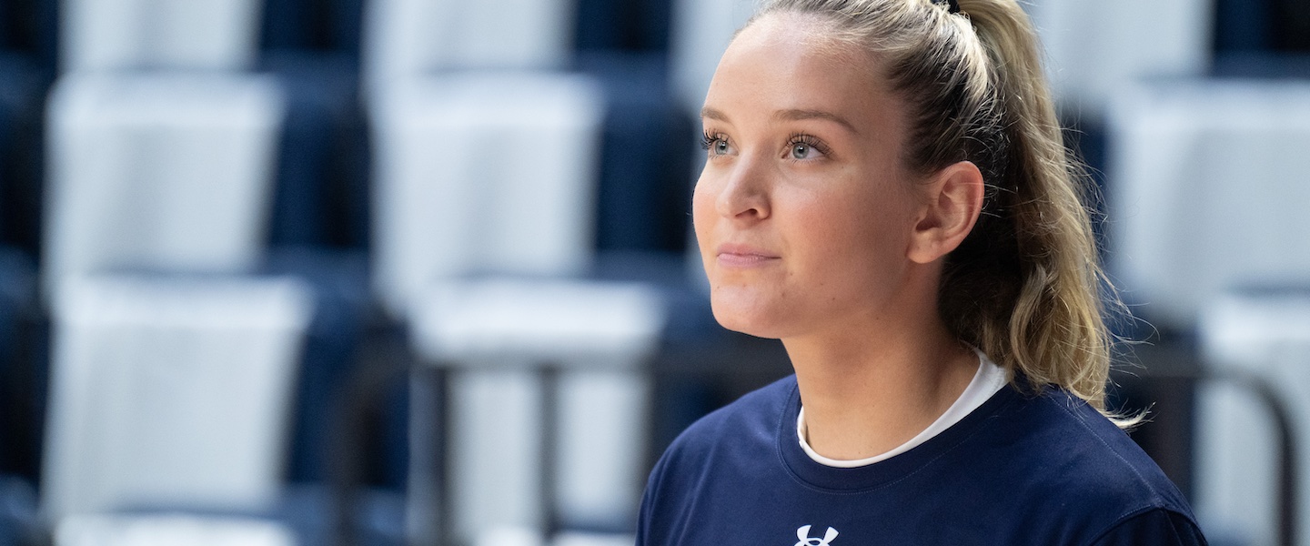 Student basketball player looks ahead on the court