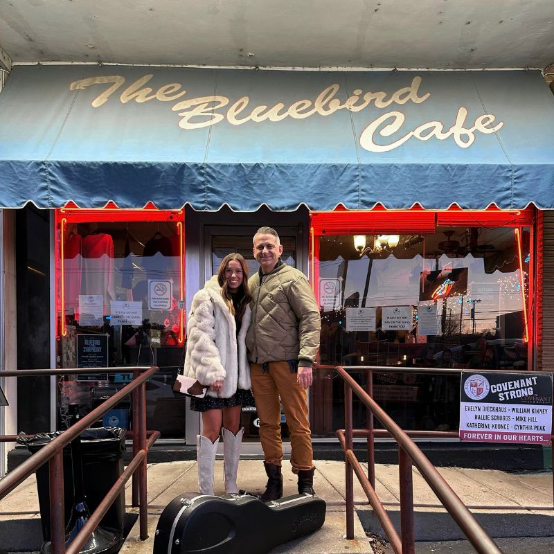 Senior Macy Dot and Drew Ramsey in front of The Bluebird Cafe