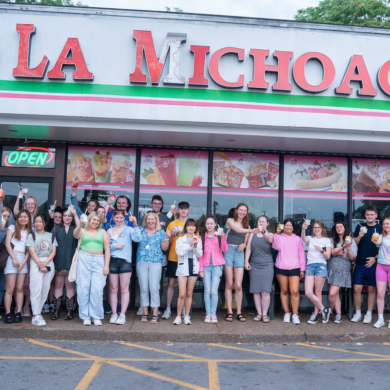 Belfast students in front of an ice cream shop