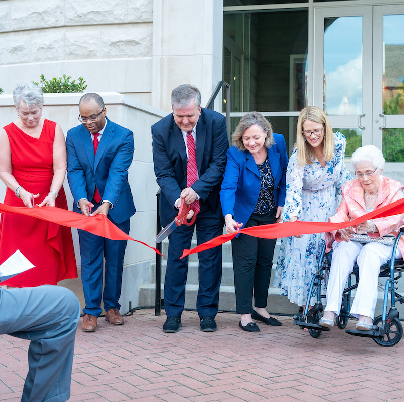 Dr. Greg Jones, the Rev. Susan Pendleton Jones, Barbara Massey Rogers and Dean Fisher Gardial cutting the ribbon..