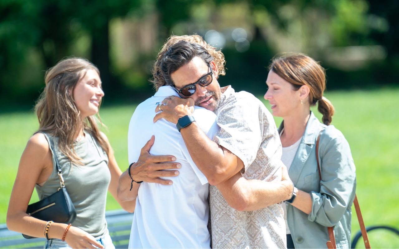 New student hugs family member before they leave