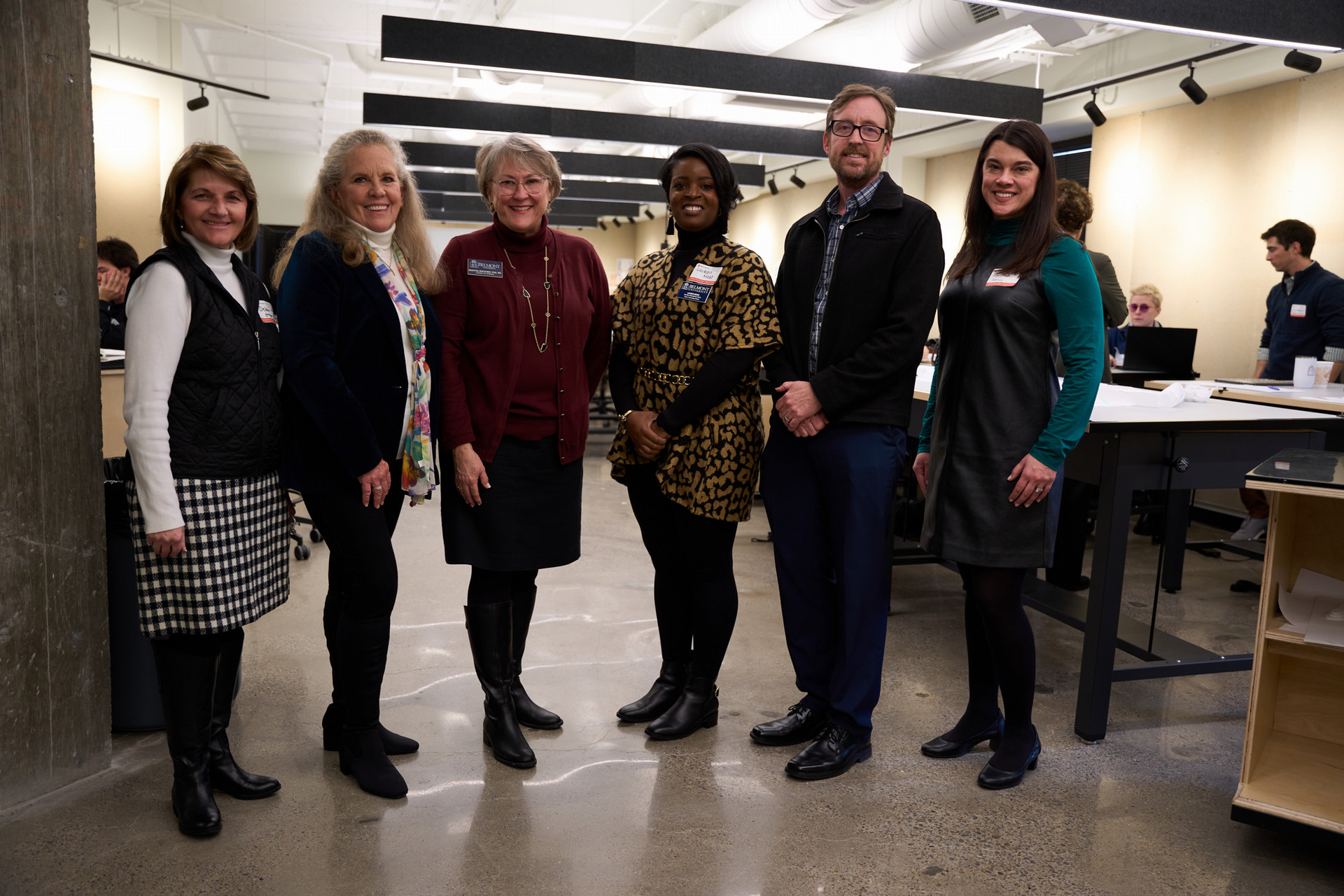 Belmont faculty stand side by side in the Gabhart studios