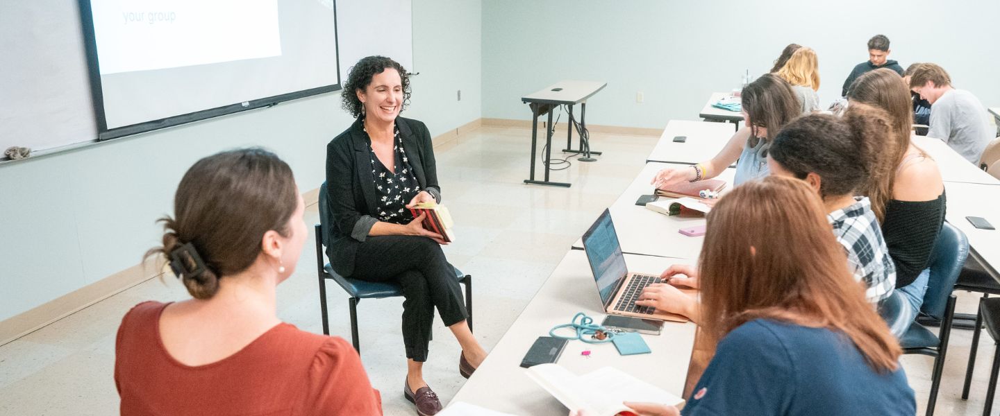 Dr. Susan Finch leads an English class