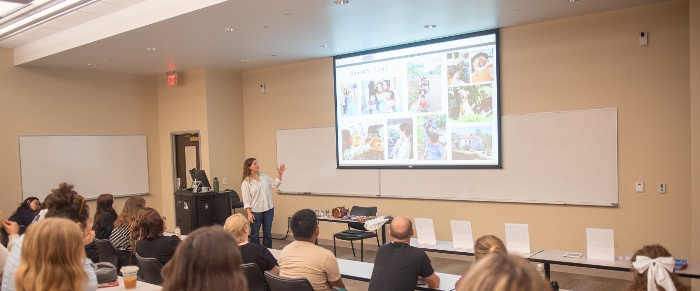 Yordy recaps her trip to a room of Belmont students