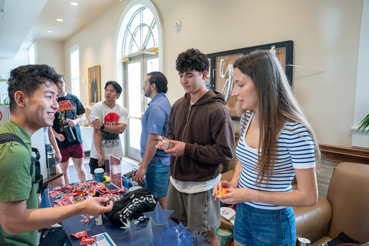 Business student talking at Massey Day celebration