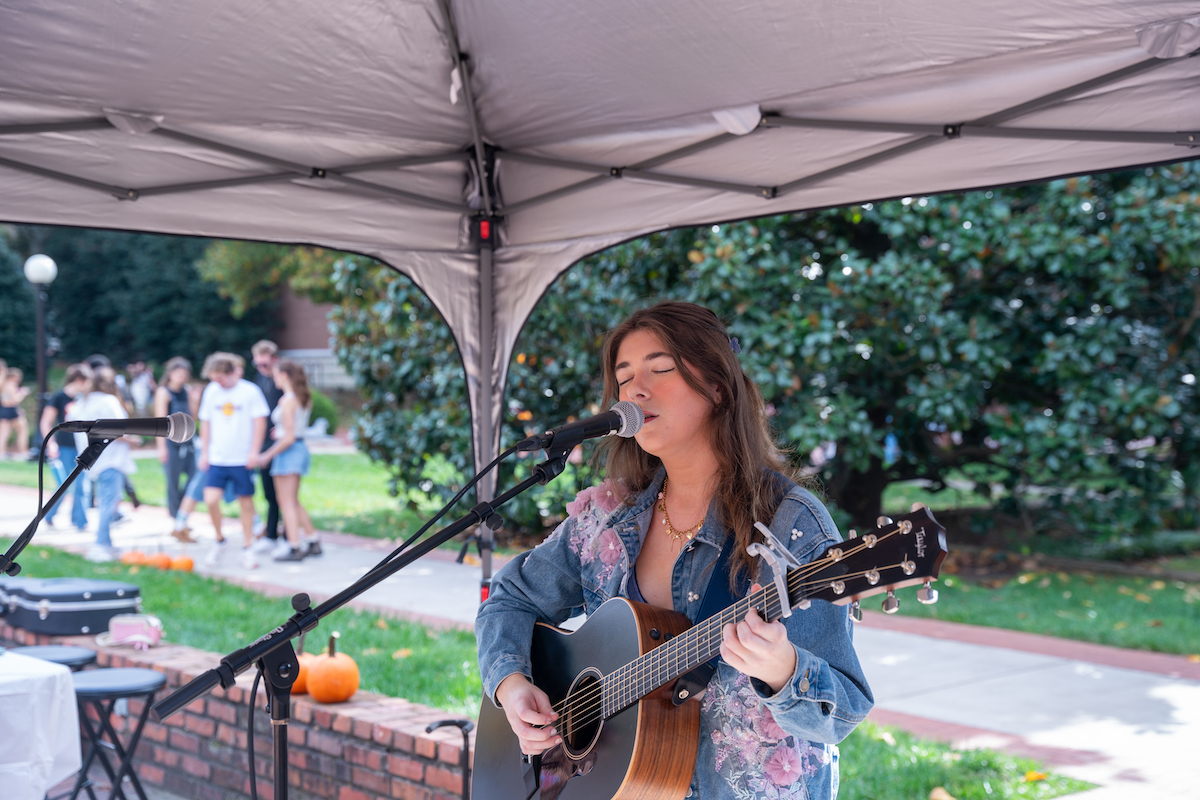 Student playing guitar