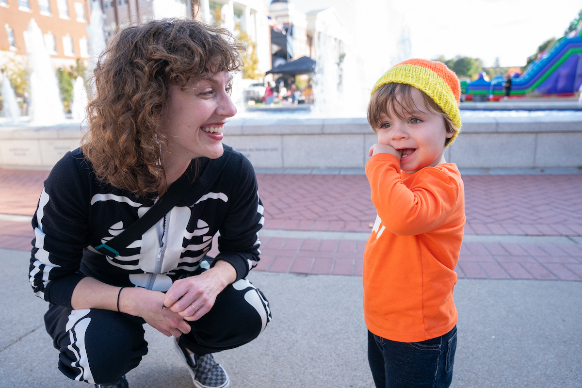 Child and parent in costumes