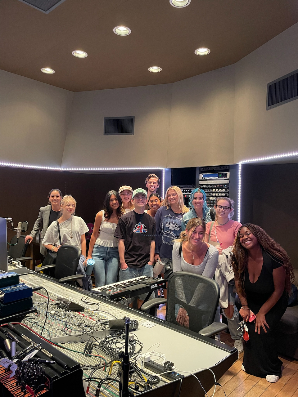 Entertainment and Culture Class at Pulse Music Group. (Pictured: Stephanie Hajjar, Mikayla Williams, Kaitlynn Alcala, Julia Larson, Zach Clar, Caleb Pierce, Olivia Gonzalez, Sydni Mulligan, Keely Mulvihill, Danielle LeVasseur, Aliya Hedgecock, Kadaisha Summers. Photo Credit: Lexi Deeb)