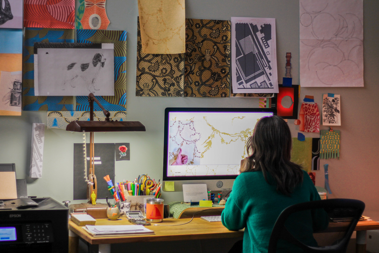 Williams working on the mansion wallpaper in her studio