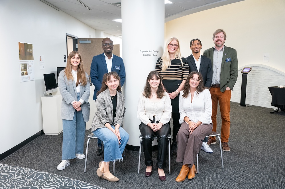 Six student designers with Dr. Emmanuel Saka and Dr. James Pierce