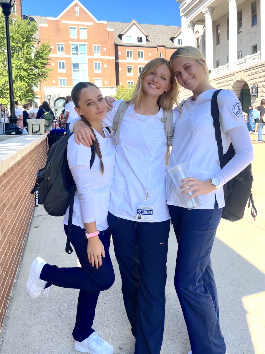 Haley Weaver (right) and friends in scrubs