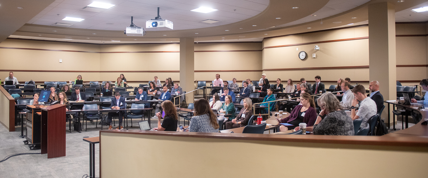 Conference room with symposium attendees