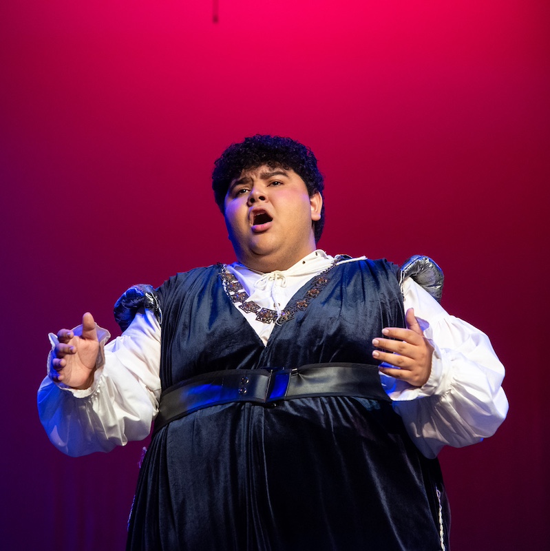 male student Javi Castro in costume performing as Romeo in the opera adaptation of "Romeo and Juliet"