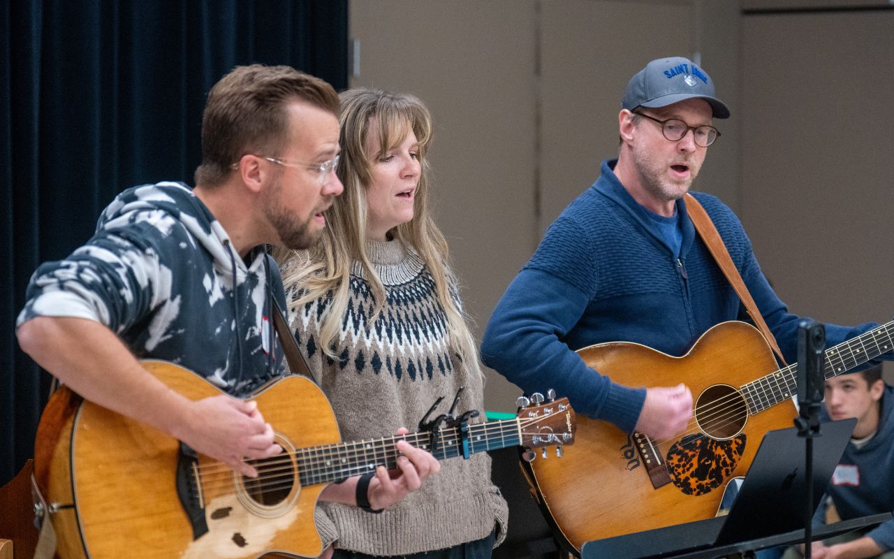 Songwriters write a song together during The Friendship Project