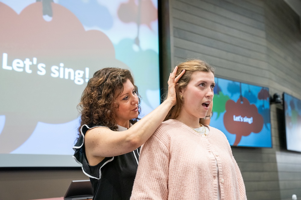 Faculty instructing on vocal technique