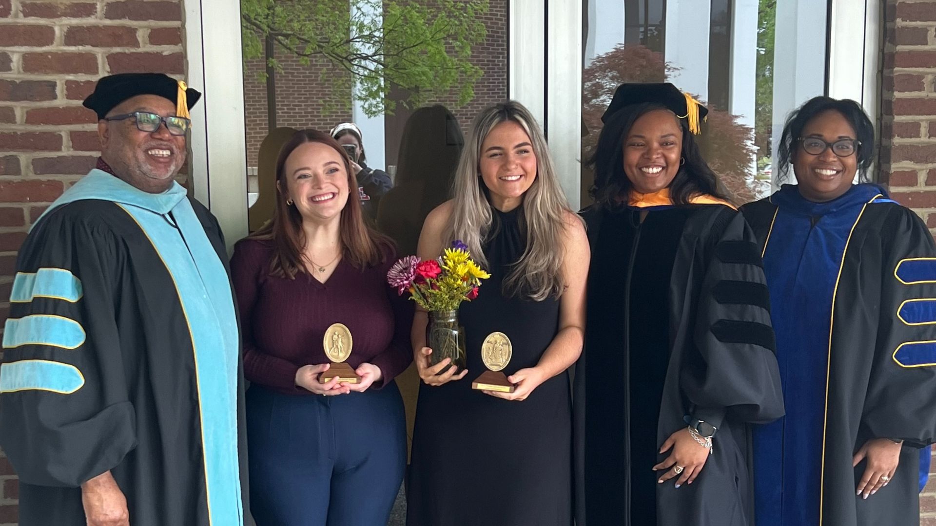 Deffendoll celebrates with family and friends after receiving the Mary Mildreal Sullivan Award