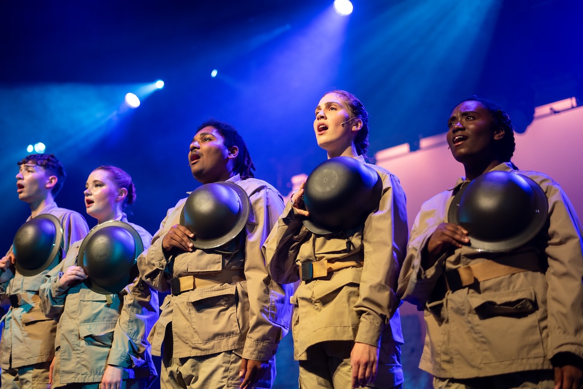 students sing in production of No Man's Land