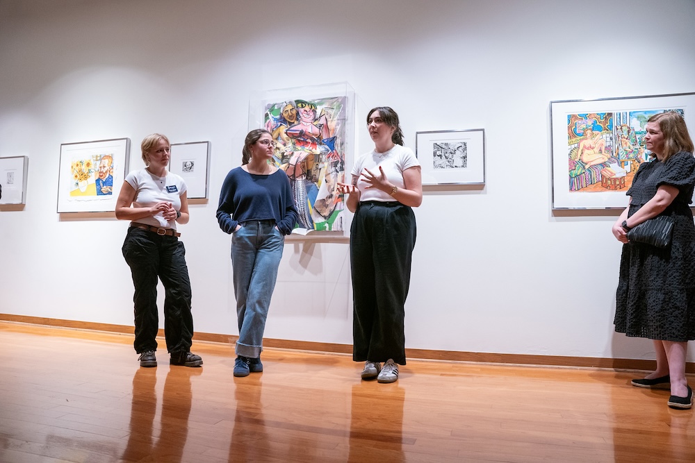 students give remarks at gallery's opening event