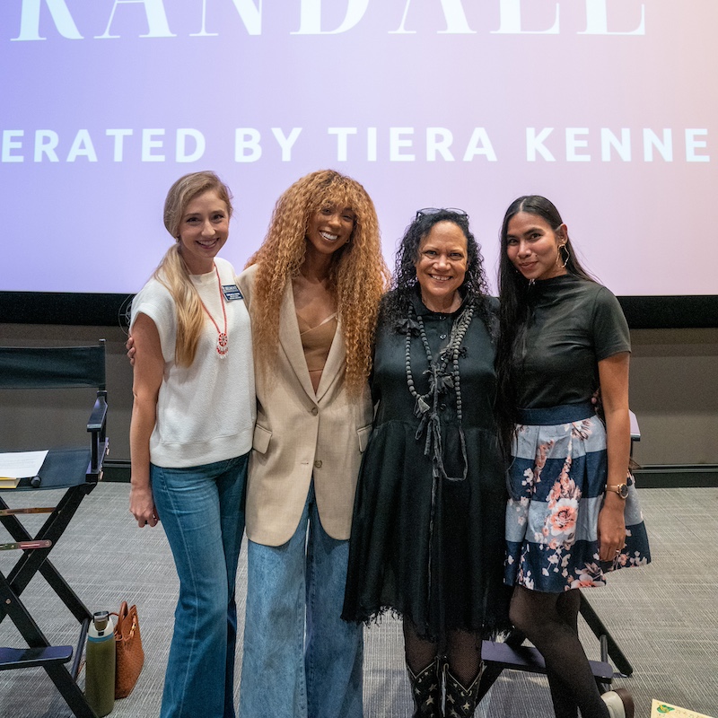 Alice Randall, Tiera Kennedy and two Belmont staff smiling at the camera during Randall's event