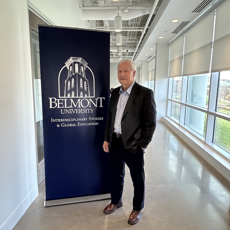 Dr. Bob Fisher poses outside of ISGE office