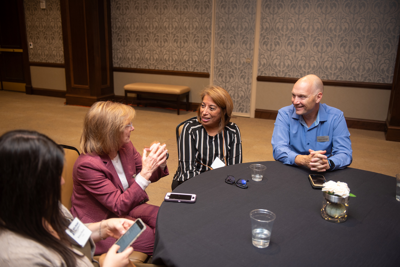 People sitting a round table