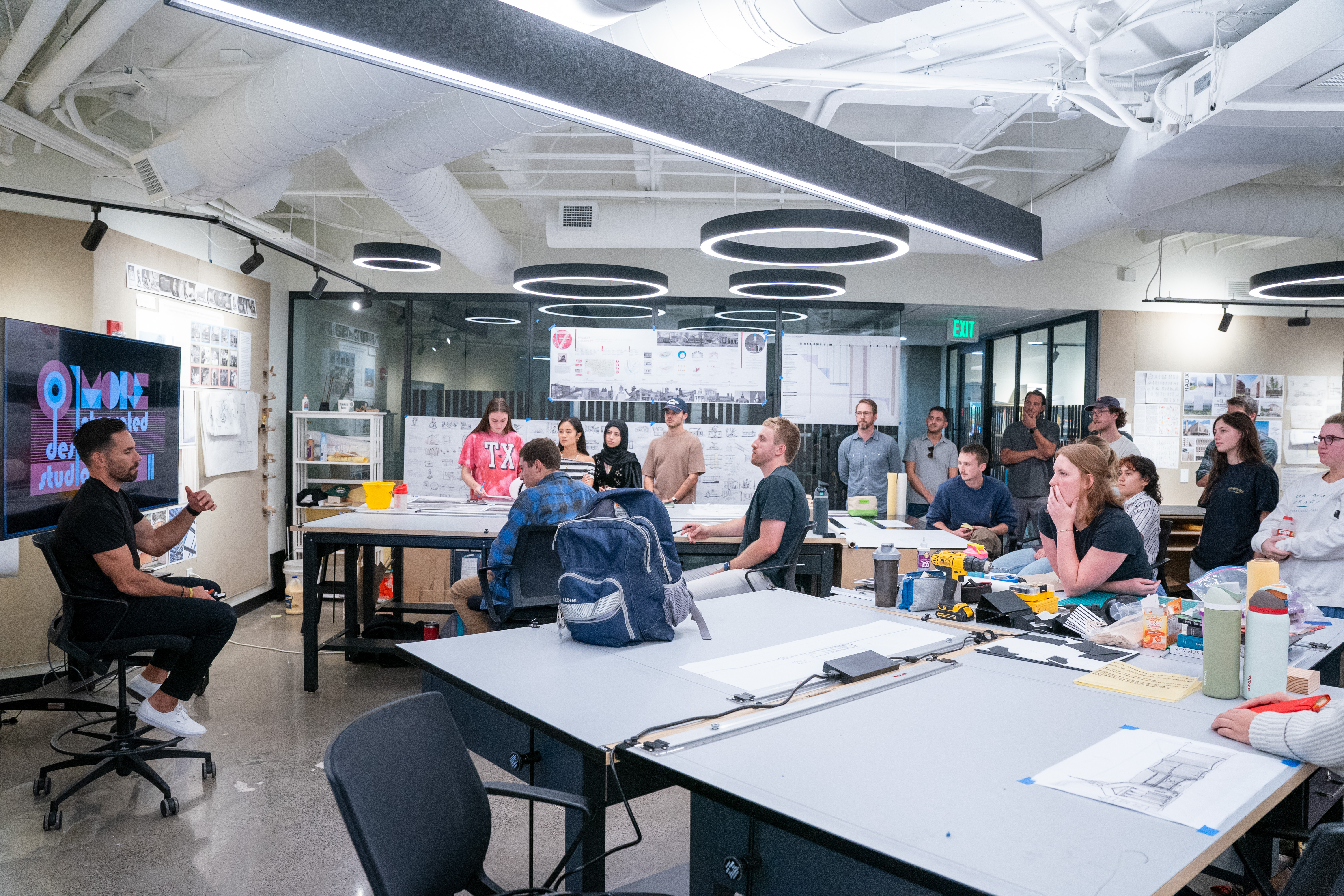 Architecture professor walks students through their joint studio project