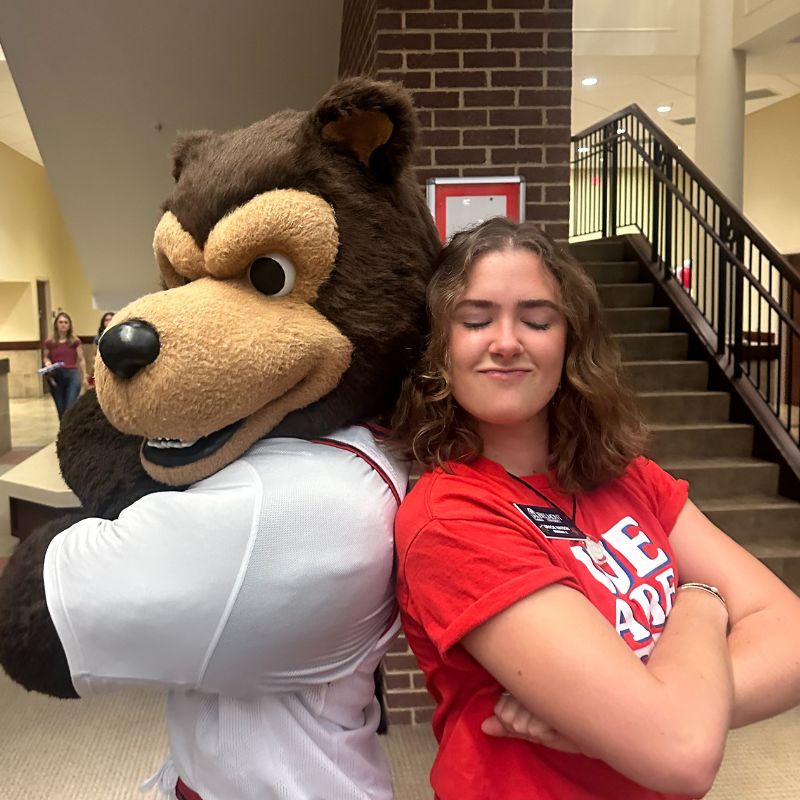 Gracie Watson poses with Bruiser