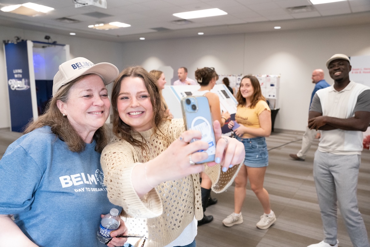 Susan Jones takes a selfie with one of the students