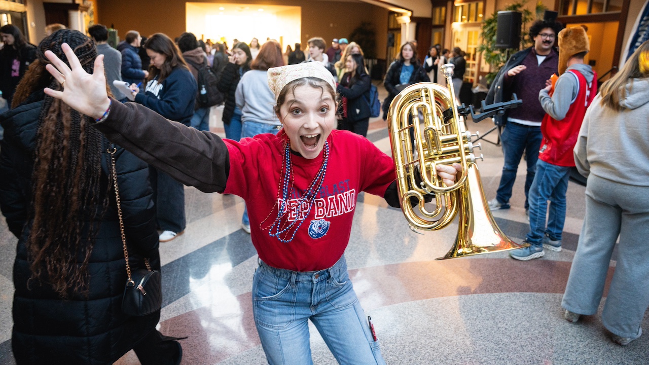 pep band student cheering