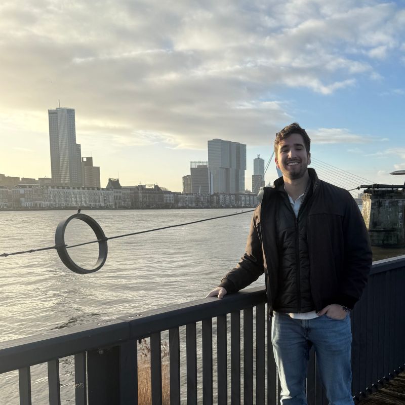 Cavin Horback poses in front of the sea