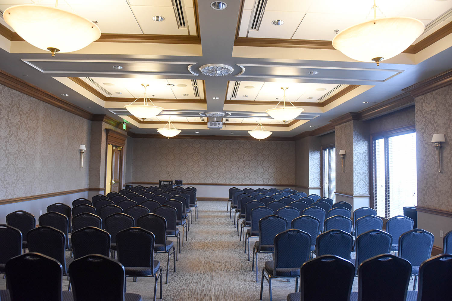 Massey Boardroom with empty chairs lined up