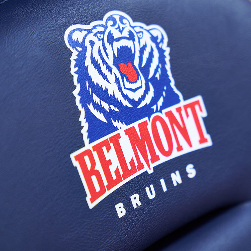 Close-up of the Belmont Bruins logo featuring a roaring bear, printed on a blue background.